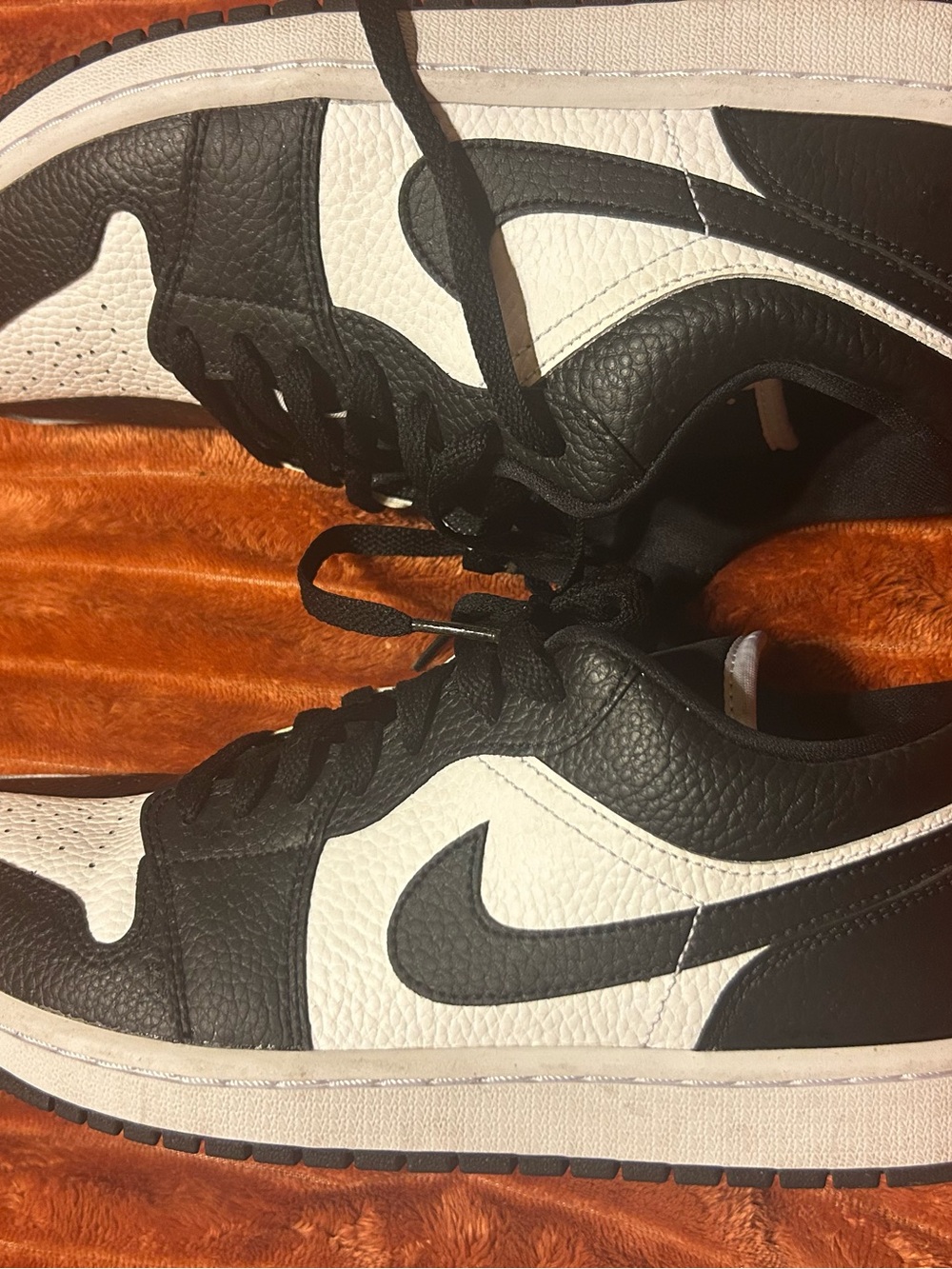 Women’s Black and White Low-Top Jordan 1 Sneakers - Picture 3 of 4